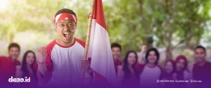 seorang laki laki memakai baju berwarna merah putih dengan ikat kepala yang juga berwarna merah putih sedang membawa bendera negara Indonesia berwarna merah putih meneriakan promosi hari kemerdekaan